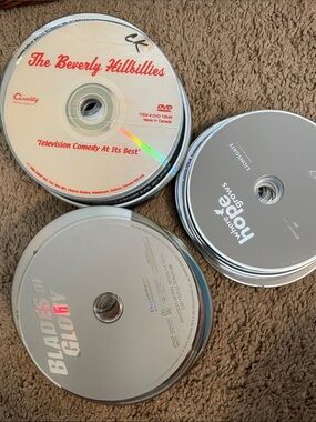 Around 90 tv and movie‎ discs